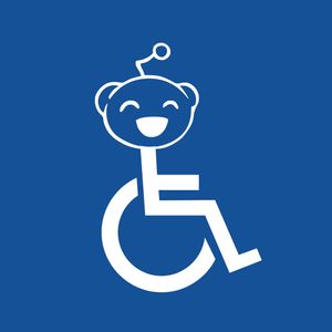 The international symbol of access (wheelchair synbol) with the Reddit mascot's head.